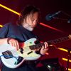 Thom Yorke playing a Fender bass with The Smile
